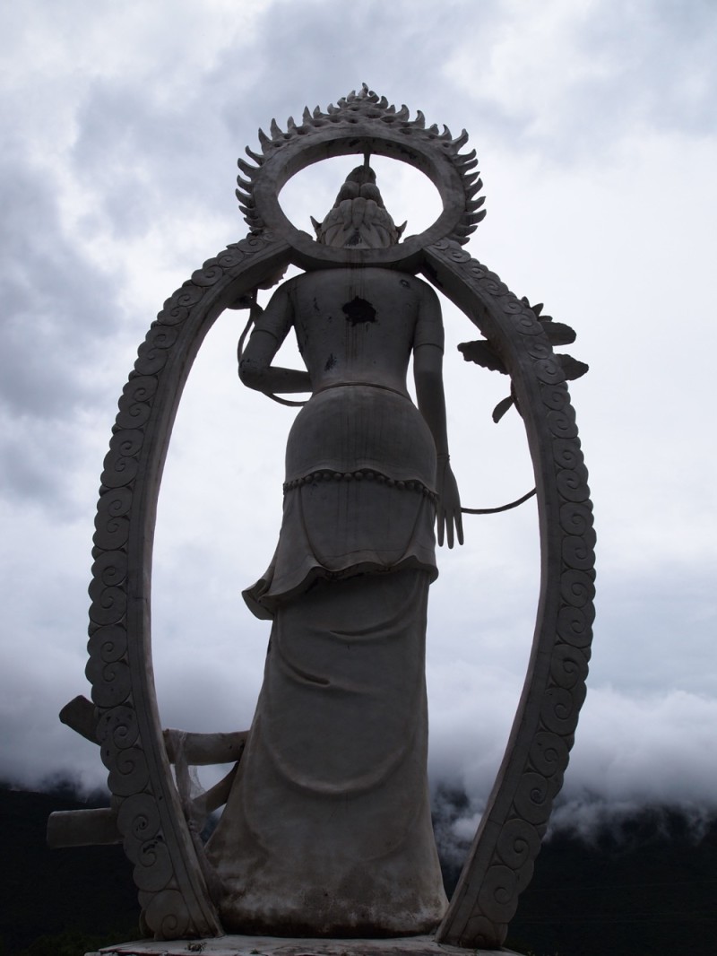 Statue and Clouds Kangding China Sichuan